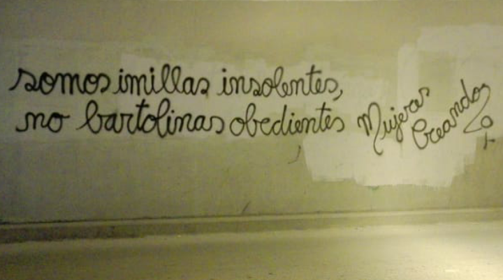 "Somos imillas insolentes, no bartolinas obedientes" grafitti de mujeres creando
